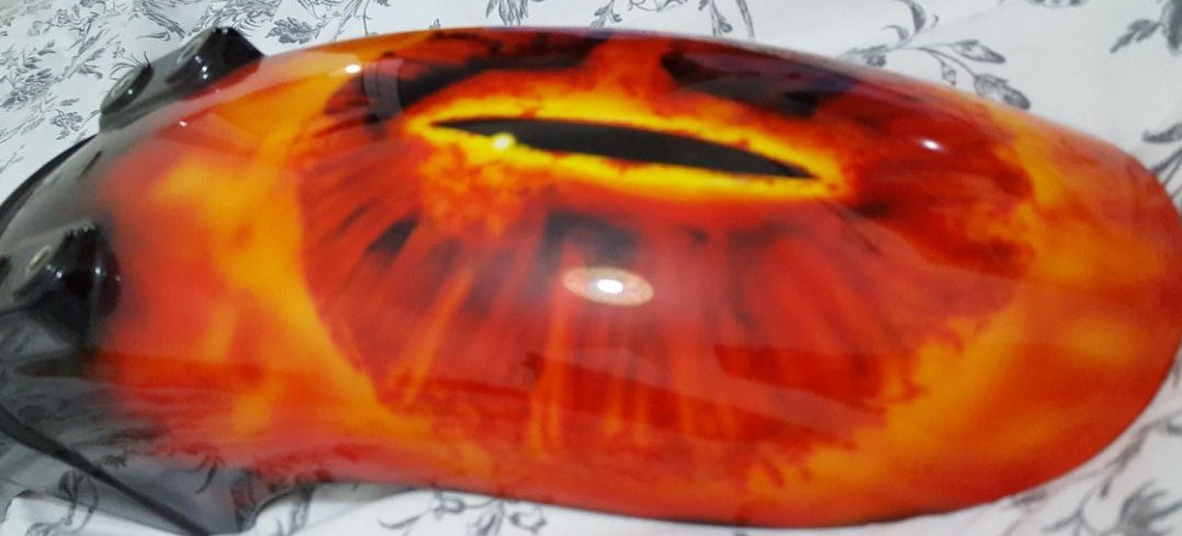 Airbrushed Painting of the lord of the rings eye of Sauron on a front mud guard